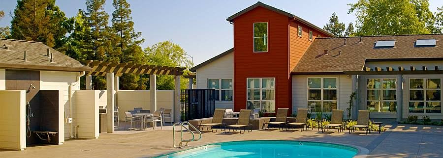 Swimming pool, sundeck with lounge seating