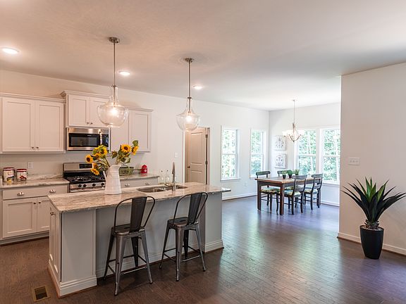 Kitchen open to Breakfast Area