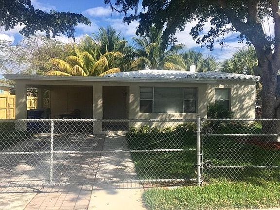carport and lockable rolling front gate