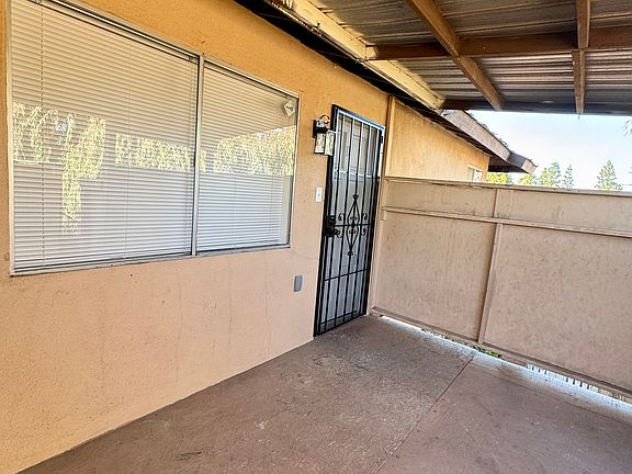 Entrance to living room with new screen privacy door