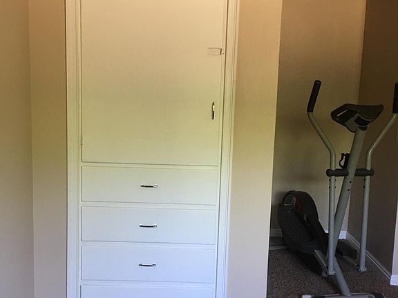 Lots of extra space with this build in dresser that is very