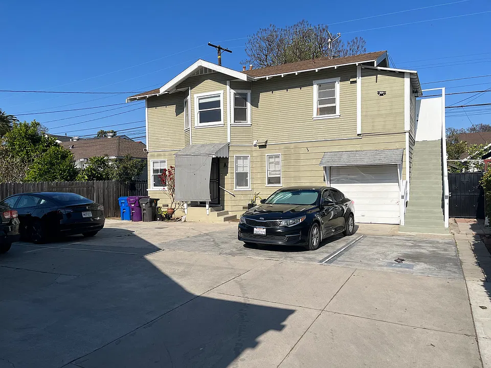Upper unit apartment, entrance behind a security gate, w/one designated parking spot