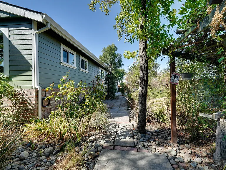 Side path to garage.