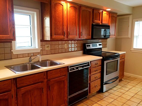 Kitchen has lots of light, counter space