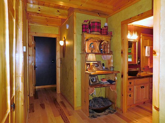 Hall to BRs and sun room