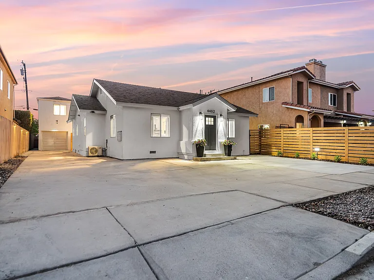 2 designated parking spots at the front of the house.