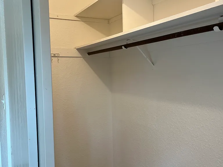 Master bedroom has extra deep lighted closet