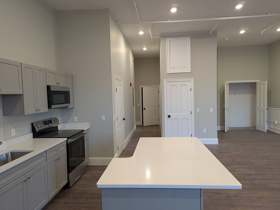 Kitchen area facing entrance