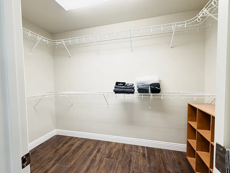 Walk-in closet with shoe rack is all you need.