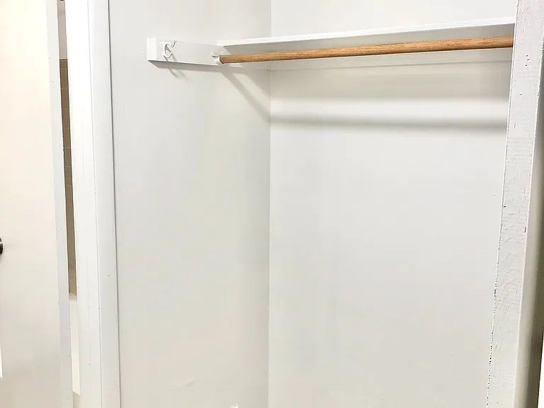 Experience ample storage with this walk-in closet, perfect for organizing your wardrobe. Experience ample storage with this walk-in closet, perfect for organizing your wardrobe.