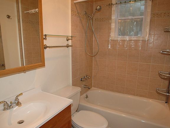 Freshly tiled bathroom with new fixtures