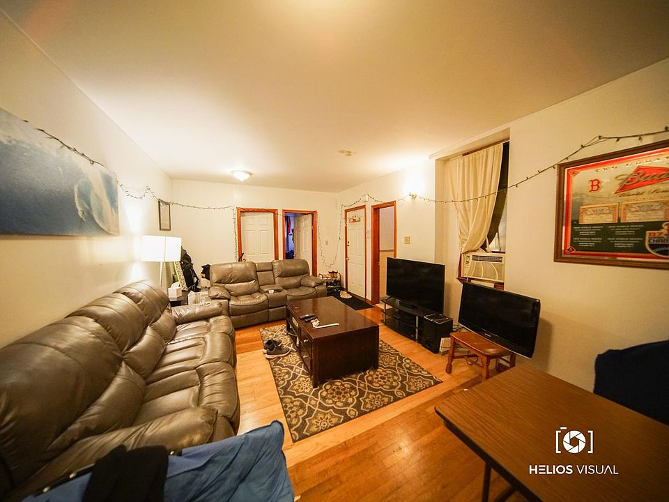 Living room with space for a dining table.