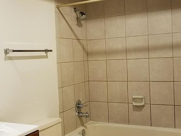 Bathtub, shower.