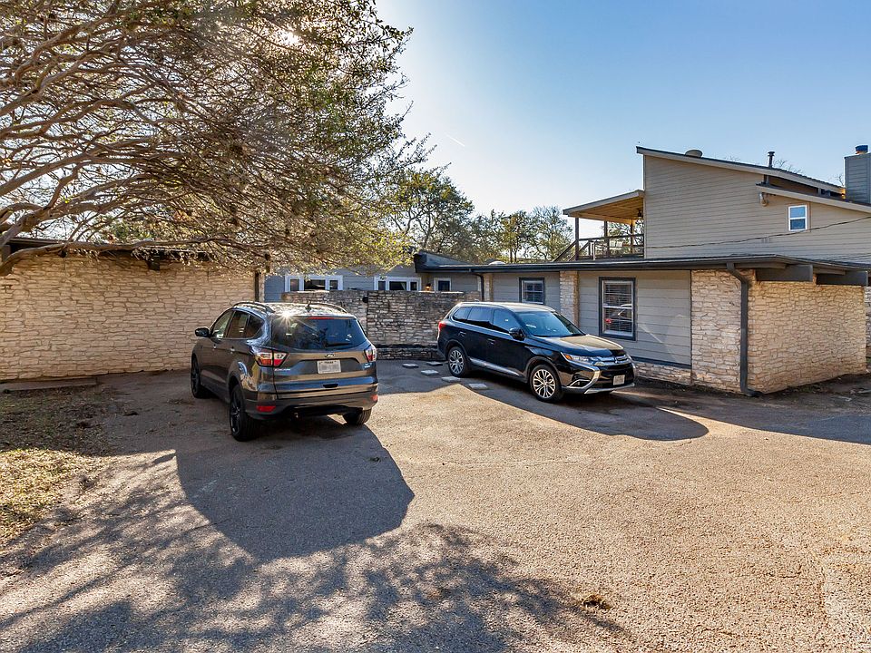 Front of property. Parking for two on left side. Right side for A unit