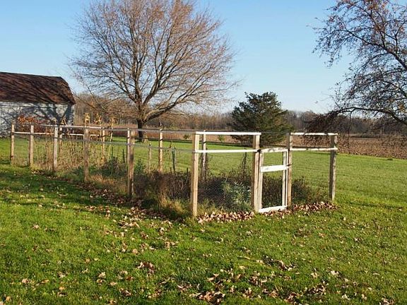 Great garden spot- all fenced to keep the deer out! 7 apple trees too.