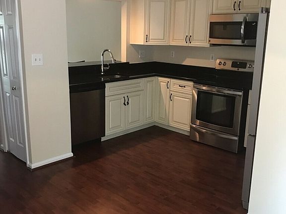 4th image of 8610 Woodland Manor Dr #1