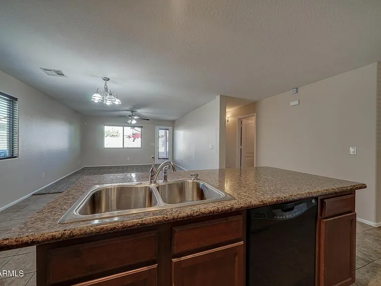 Standing in the kitchen looking towards the backyard