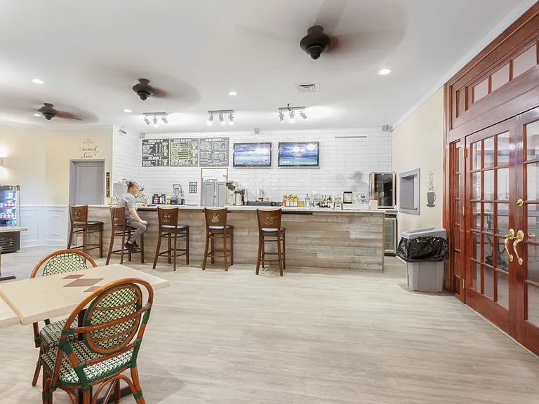 Unwind in the inviting lounge area of The Century, where modern design meets comfort. Enjoy relaxed gatherings, stylish decor, and a vibrant atmosphere perfect for socializing. Explore your new home today!