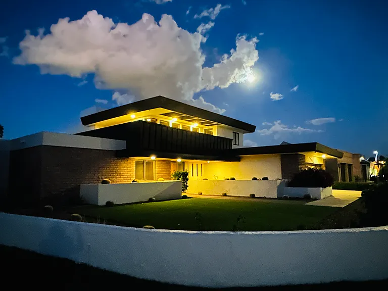 A true jewel of the lakefront , radiating a warm inviting glow at night time...
