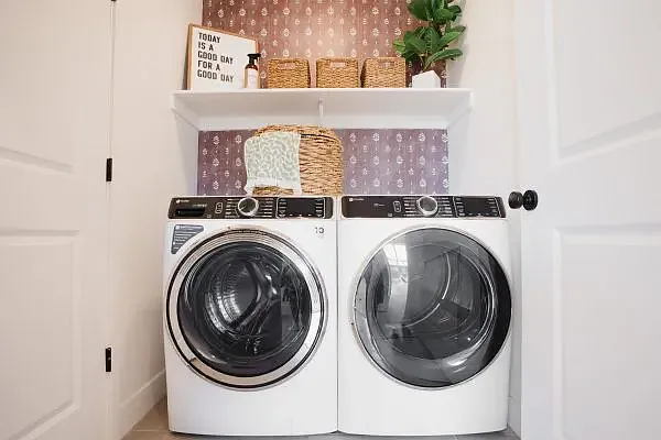 Staged photo. Tenet has access to a washer and dryer.