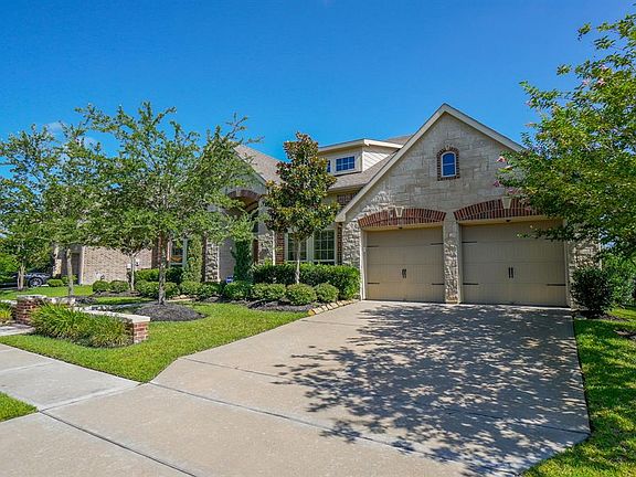 Enjoy plenty of storage in this three car attached garage.