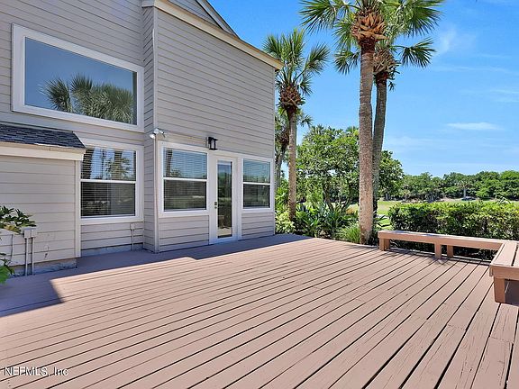Back deck with views over golf course and soon pond overlooking golf course. Lots of Privacy.