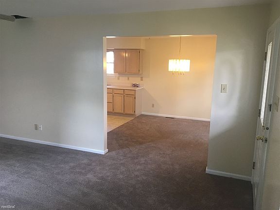 Living room dining room newly installed carpet
