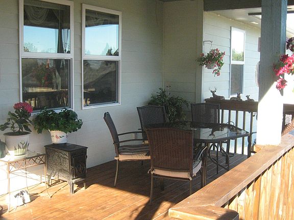Entertain on the covered deck adjacent to kitchen-family room