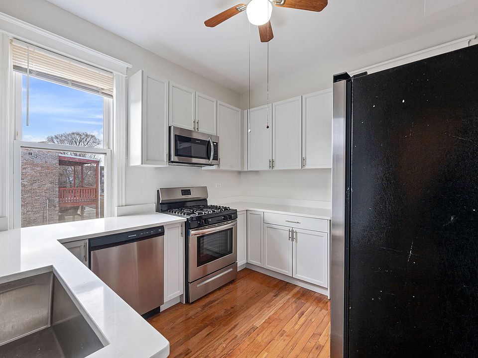 Newly renovated kitchen with ample counter space and storage.