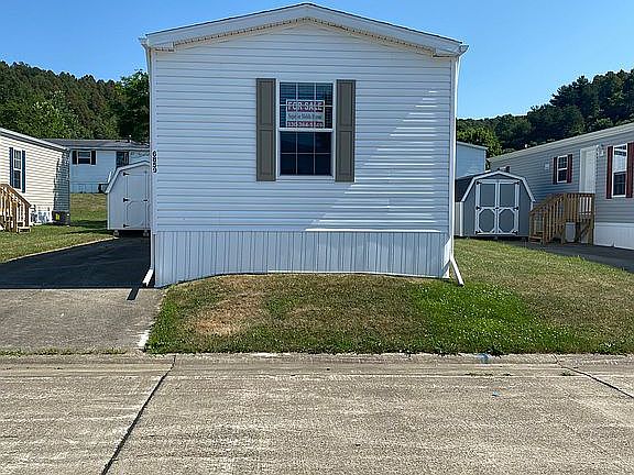 6859 Whitetail Dr - side