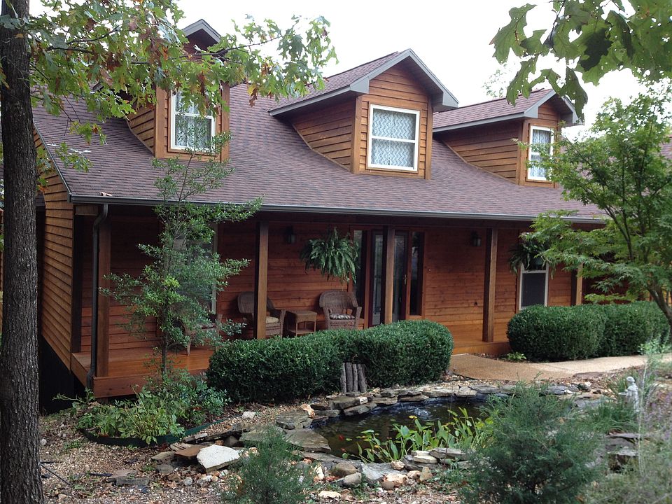 Front of house with Koi pond