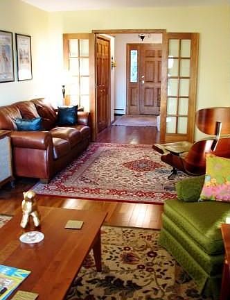 Welcoming entry leads into large living room.