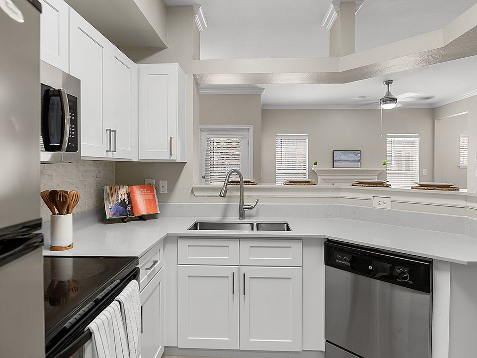 Kitchen with Stainless Steel Appliances and Quartz Countertops