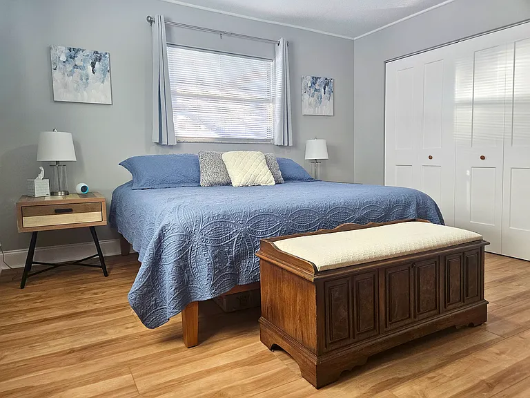 Spacious Master Bedroom with a King Bed, 60" Smart TV and Large Closets
