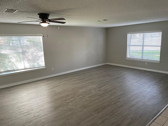 Enter into a sun drenched living room with brand new luxury LVP floors!