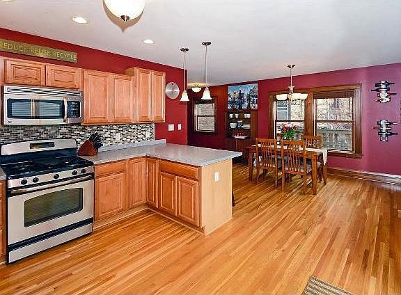 You will love the large, open kitchen with tons of counter space, cabinets and tile back splash.