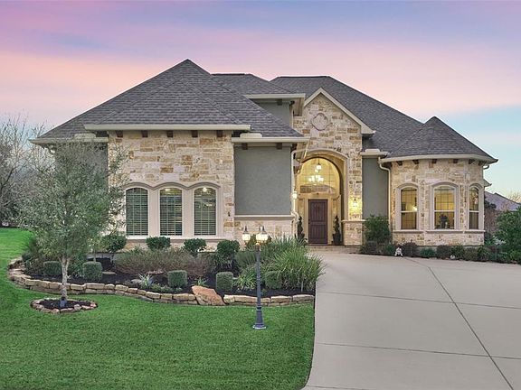 You will be impressed from the moment you pull up to the driveway. This home boasts of a timeless elevation with tasteful stucco & stone exterior. Note the beautifully arched windows, detail corbel work, and upgraded landscaping.