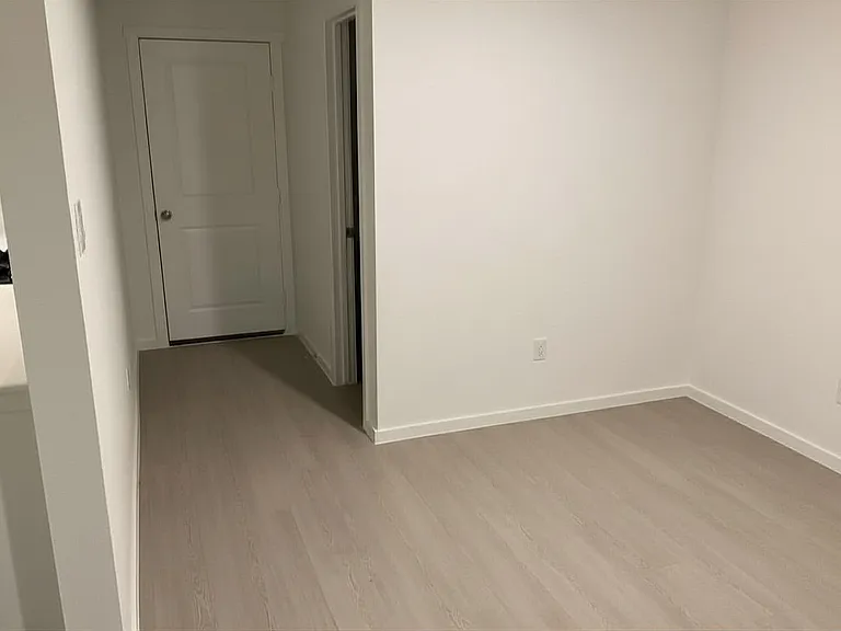 Living Room to First Floor Bathroom and Garage