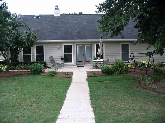 Rear view of house with patio