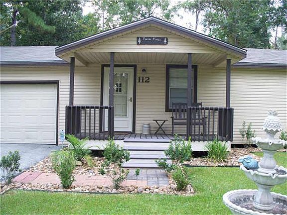 Front view - cute home in quaint lake subdivision.