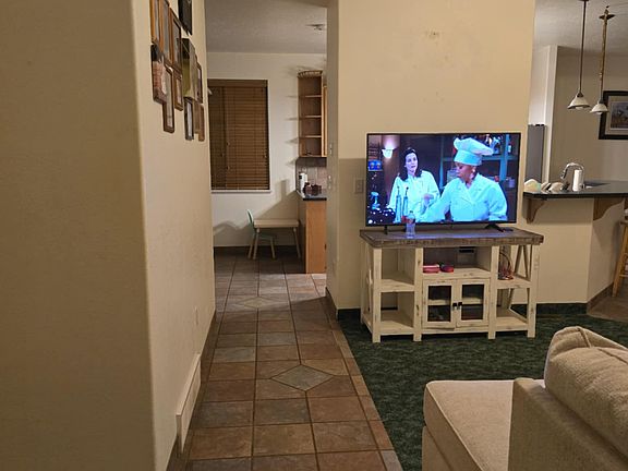 View from entry towards kitchen. Livingroom to the side.