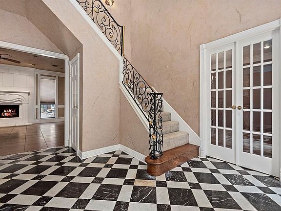 As you enter, Wine Room/Wet Bar is on the Left side. Right side is Dining Room.