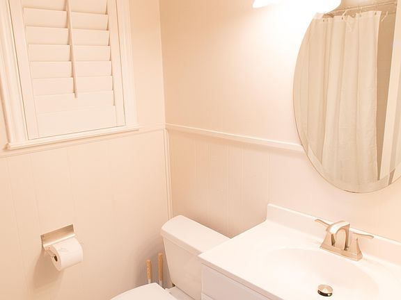 Shared bathroom with shower.
