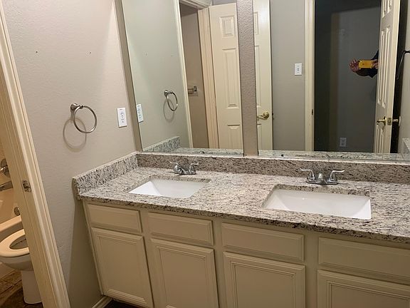Secondary bathroom, tub and toilet