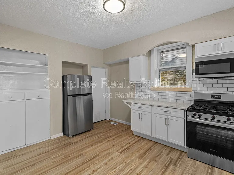 7109 Eugene Ave — Photo 5