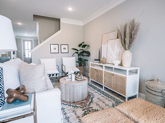 Great room in the Coral floorplan at a Meritage Homes community in Gulfport, MS.