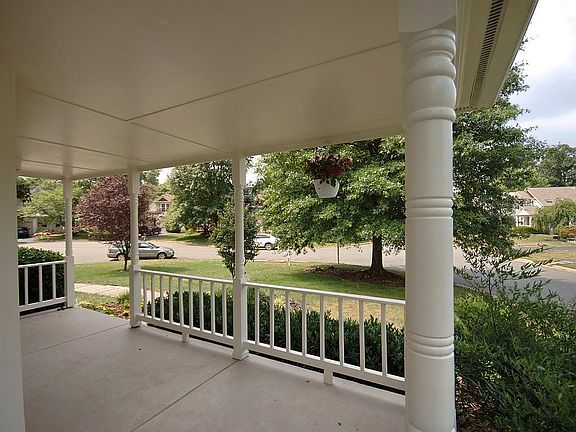 Cozy front porch with pillars