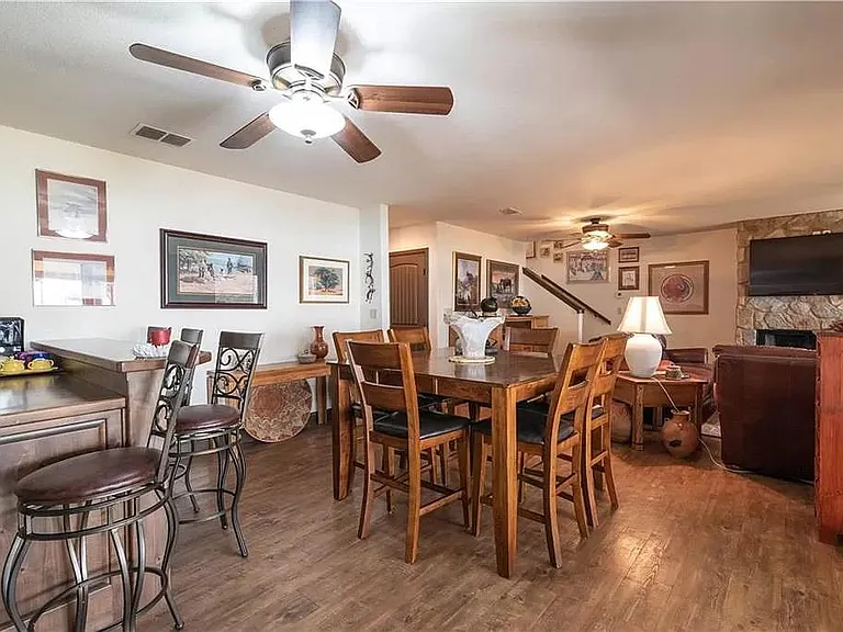 Built-in bar and open floorplan is perfect for game day or large gatherings.