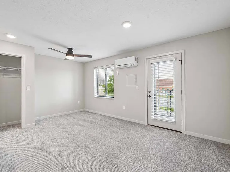 Natural light, an open layout, and direct balcony access create a bright and inviting space designed for comfortable everyday living.