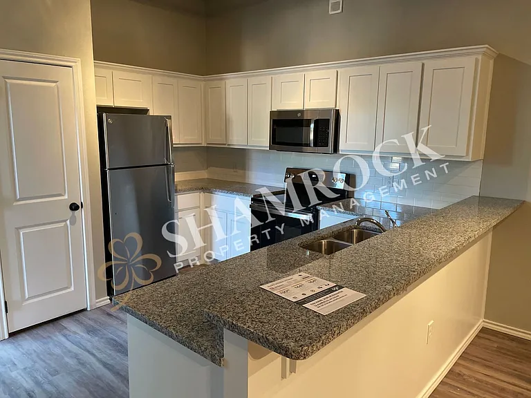701 N New Rd #102 — Photo 9